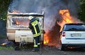 Wohnwagenbrand Koeln Rodenkirchen vor der Bruecke P079